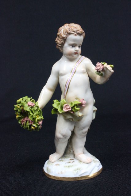 19th c. Meissen porcelain figurine: "Child with Wreath of Flowers", incised mark A69, W124, blue cross sword mark. Approx. 5" H. The property of a NYC gentleman's 20 year collection. Possible professional restorations.