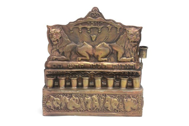 Small Brass Menorah Signed: Signed on back. Approx. 5" H. X 5" W.