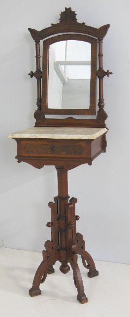 Walnut Victorian shaving stand: With swivel mirror and marble top, original finish. Approx. 69" H. X 20.5" W. X 17.5" D. Table top approx. 41" H.