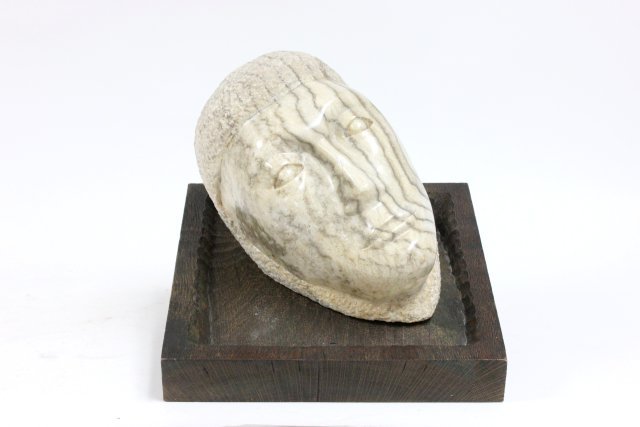 Sculpture of a marble "Head": Abstract, moderne, mounted on wood base. Approx. 11" x 8" x 6.5" D.