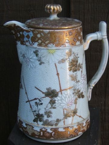 Early Coralene Nippon covered teapot: Unmarked, wonderful "Floral" design. Approx. 7.5" H x 6" W from handle to spout. Please read our terms of sale.