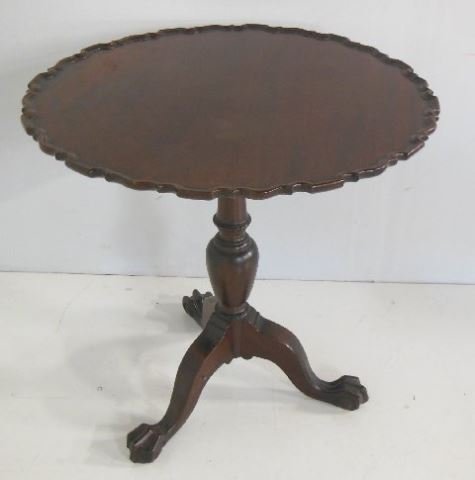 Tilt top mahogany ball & claw George III table: Approx. 26" D x 28.5" H.