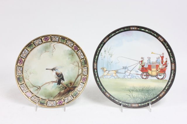 2 Nippon decorative plates: 1- "Bird on a Branch", approx. 10" Diam. 1- "Horse Drawn Carriage Trumpeting Arrival", approx. 11" Diam.