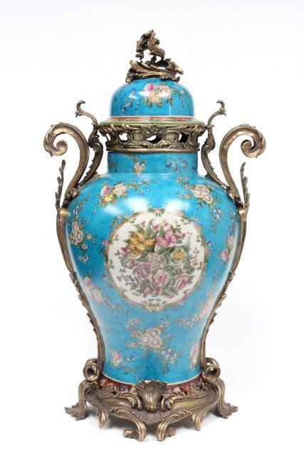 Handpainted blue urn: With bronze ormolu. Approx. 27" H x 15" W.