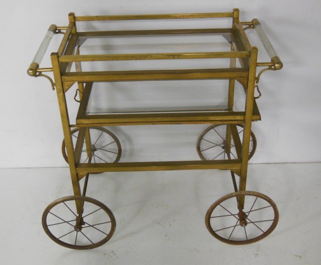 Brass & glass teacart: With slide in tray & Lucite handles. Small brass mount missing. Approx. 30" x 15" x 30"