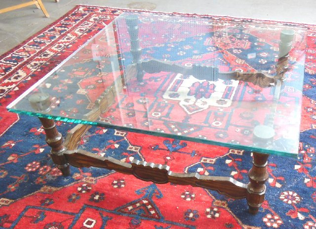 Glass top wood carved coffee table: Square. Approx. 17.25" H x 42".