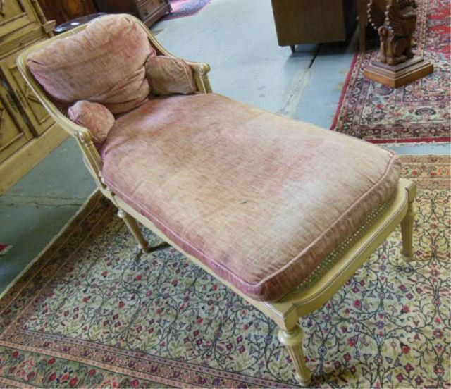 Louis XVI style chaise lounge ca. 1930's: Cane seat & back, pink clown cushion seat & back. Approx. 60" x 23" x 34" H back .