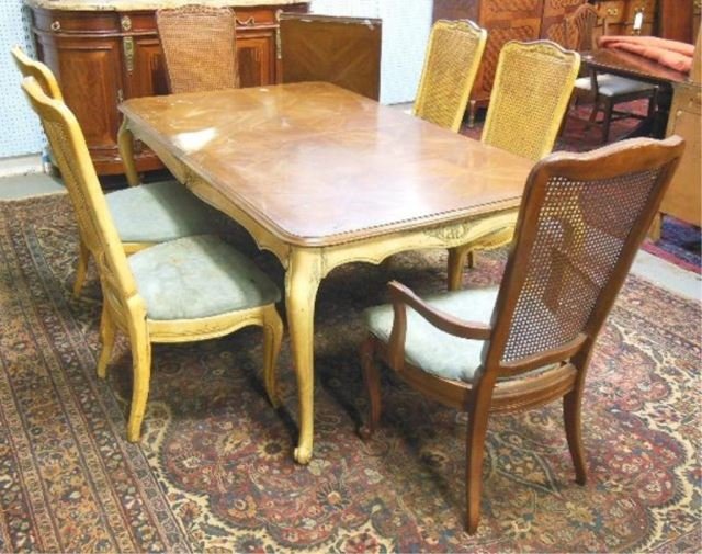 Parquetry top dining room table with 6 chairs: Chairs need recovering, 2 boards (20" W). Table approx. 70' x 44".