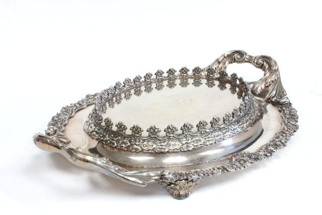 Silver plated centerpiece: With flowered repousse. Approx. 18" W x 14.5"