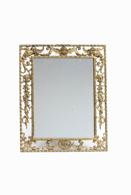 Figural bronze table top mirror: Approx. 18.25 H x 14.5" W.