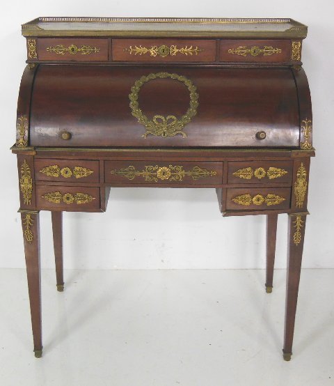 19th c. marble top French cylinder roll desk: With bronze mounts & gallery. Approx. 34" W x 20" D x 42" H.