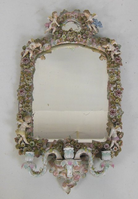 Early 20th c. porcelain Dresden figural: With floral mirror, 3 candle arms, & wood back . Minor losses. Approx. 32" H x 17.75" W.
