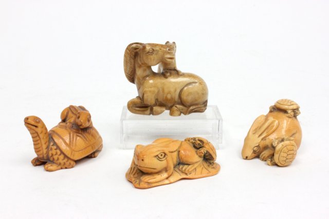 4 19th c. boxwood or bone Netsuke: 2 Horses, Rabbit on Turtle, 2 Turtles & Rabbit, Rabbit on Frog. Tallest approx. 1 3/8" H.