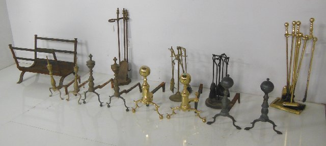 Set of fireplace equipment: Including: wrought iron log holder, set of assorted tools, & several pairs of andirons. Collection from Estate of Chalmers Benedict Wood, Foreign Service Officer & Ambassador to New Zealand.