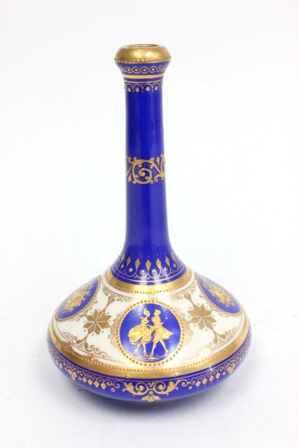 Dresden fluted vase: With raised gold design. Approx. 7.75" H.