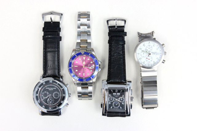 Group lot of 4 watches: Including copy of Patek Philippe.