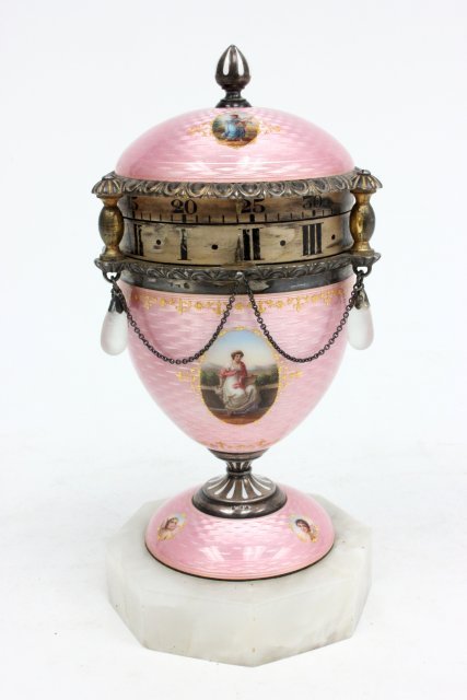 Fine Austrian silver & enamel rotary clock: Ca. late 19th/early 20th c., egg form with finely painted cartouches of "Young Beauties" on pink translucent enamel. Clock Swiss made, marble base, stamped "Made in Austria". Silver mark on rim .935.