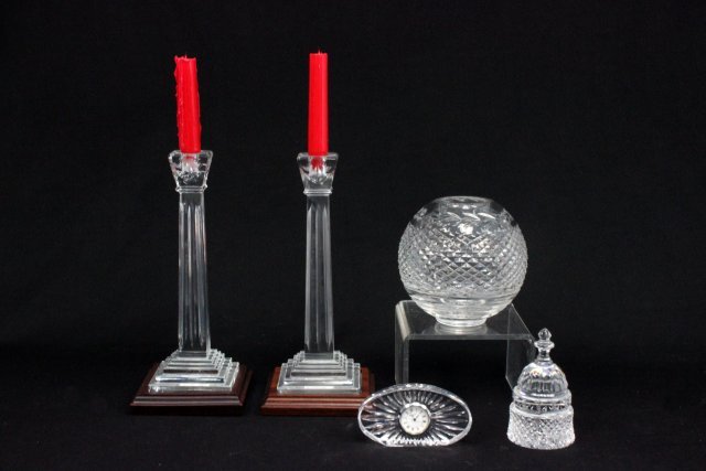 Group lot of Waterford crystal: Including a pair of candlesticks, rosebowl, clock, & bell paperweight. Assorted sizes. From the estate of Duncan Thecker.