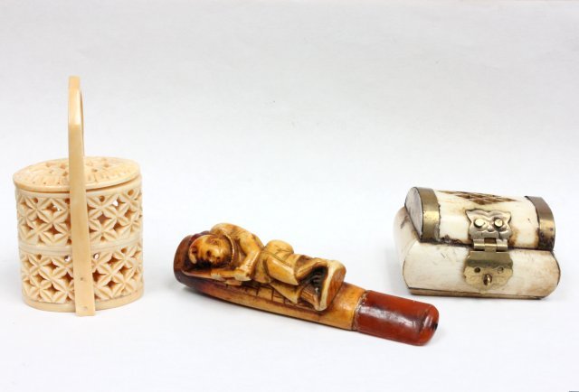 Group lot: Including carved cigarette holder depicting "hunchback & bone carved basket, & small bone ring box. From Brooklyn, NY estate.