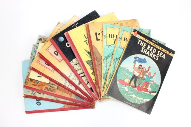 Lot of Herge comic books: Some in French and English. " Les Adventures De Tintin" 11 books in total. Collection from Estate of Chalmers Benedict Wood, Foreign Service Officer & Ambassador to New Zealand