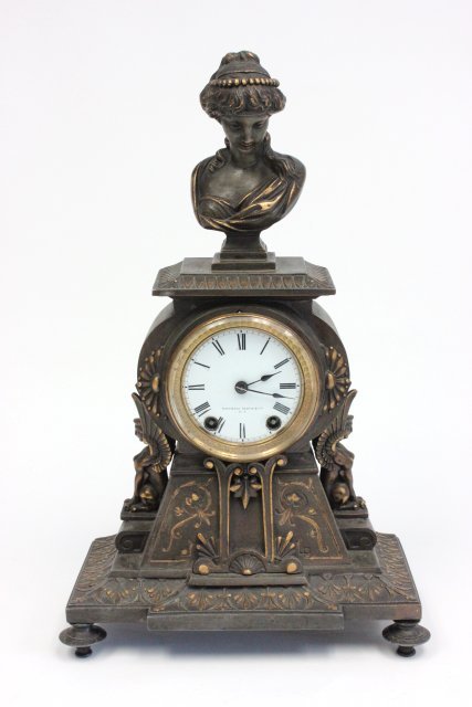 19th c. Victorian gilt metal mantle clock: Mitchell, Vance Co., NY, "Bust of Venus" on top, winged caryatids. Approx. 16.5" H x 9.5" across.