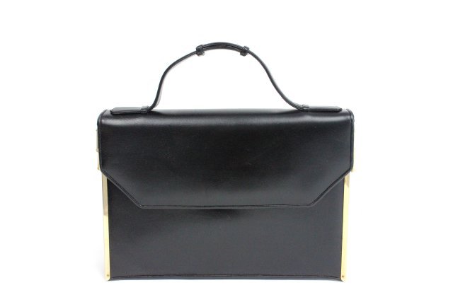 Judith Lieber black leather hand bag: From Brooklyn, NY estate.