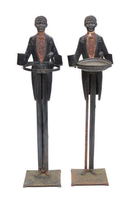 Pr. black memorabilia figural butler: Wist cast iron ash stands. Approx. 34" H. Worn paint . One missing insert. From Brooklyn, NY estate.