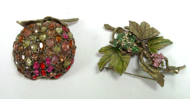 Vintage costume pair of Jay Strongwater pins: Marked. 1 pin depicts "Frogs on a Leaf" with crystals, approx. 3.75" L. 1 pin depicts an "Apple" with crystals, approx. 3". As is. All costume jewelry from the Estate of Anita Stern owner of "This n T