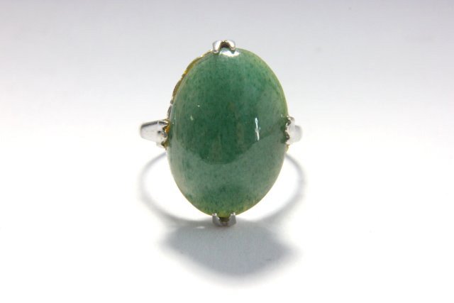 Ladies oval jade ring with silver band: From Brooklyn, NY estate.