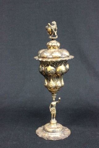 Hallmarked continental gilt silver pokal: Covered figural chalice. Approx. 11.75" H, 10.7 ozt.