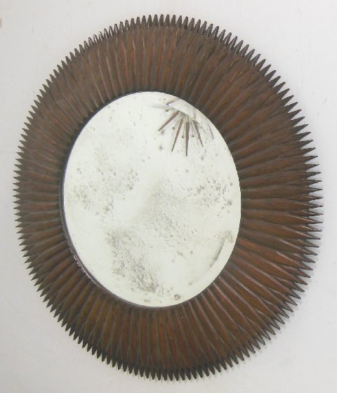 Mid century modern frame sunburst mahogany mirror: Ralph Lauren. Line crack in the wood frame. Approx. 35" Diam.