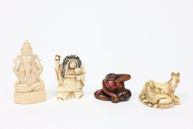 4 netsukes: Including 2 horses laying down, Hindu God, witch doctor, & contortionist. From Brooklyn, NY estate.