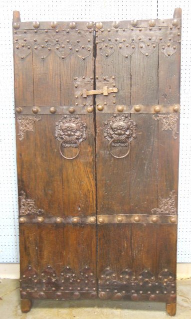 Antique Chinese wood & bronze double doors: "Foo Dog Head" knockers, slide lock. Each door is approx. 18" across x 75" H.