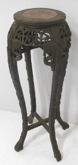 Marble top inset teakwood table: With bamboo carvings. Approx. 36" x 11" diam. From Brooklyn, NY estate.