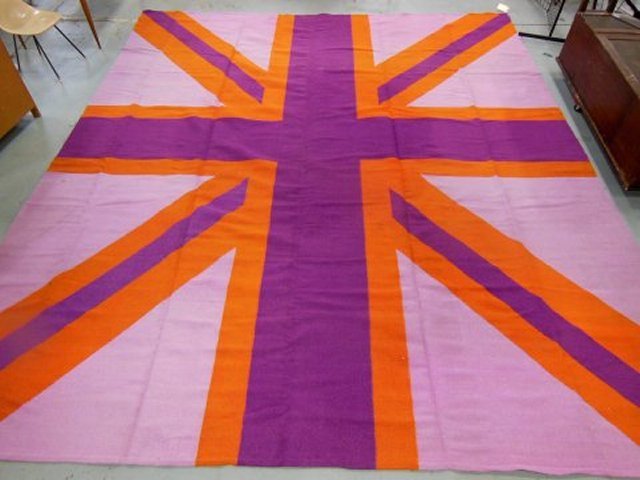 Large Modern rug signed Johnathan Adler: With "The English Union Jack Flag". Includes label on one corner. Approx. 15' x 16'. Very good condition.