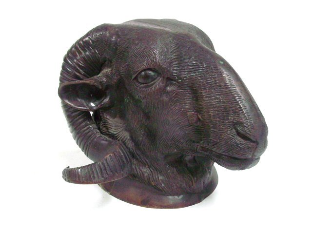 Bronze ram's head wall ornament: From the estate of Chris Peckham, a bronze ram's head wall ornament 6"H x 9"W