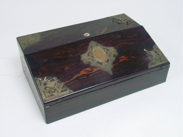 Victorian brass mounted Calamander lap desk: From the estate of Chris Peckham, a Victorian brass mounted calamander lap desk, 16"w x 10 1/2"D, fitted with secret compartment brass tarnished and lifting on corners, cracks and chips