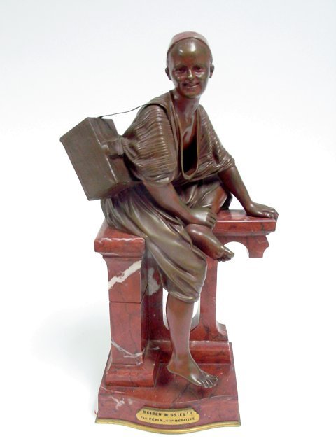Edouard Pepin bronze on marble base: From the estate of Chris Peckham, Edouard Pepin "Shoe Shine Boy" dual patinated bronze on marble Ed. Pepin 15"H patination slightly worn, base has crack and 2 chips