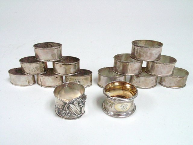 Lot of 14 Sterling Silver Napkin Rings: From the Estate of Chris Peckham. Approx. 7.5 ozt