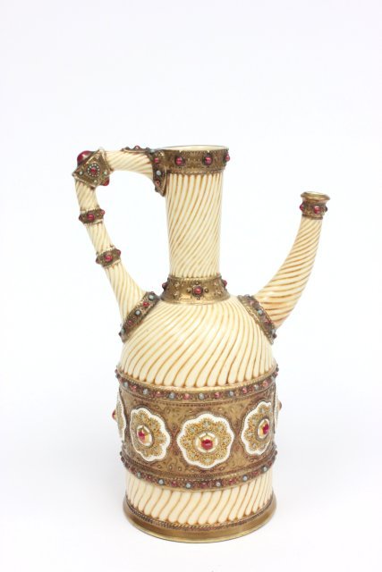 Zsolnay porcelain pitcher: Enameled. Approx. 10.5" H.