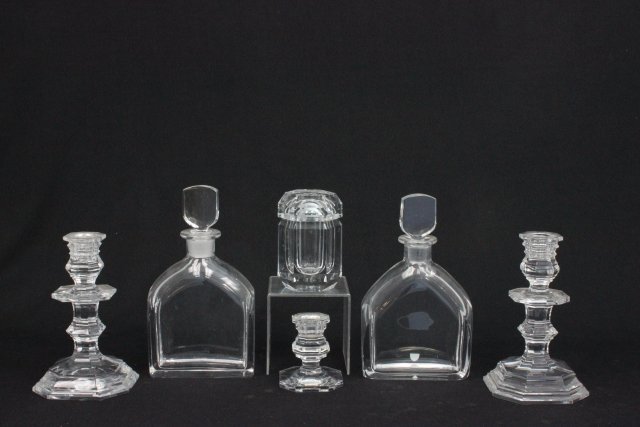 Group lot of crystal Baccarat & Orrefors: From the estate of Chris Peckham. Including Orrefors decanters, pair of Baccarat candlesticks, 1 Baccarat candleholder, & covered Baccarat box.