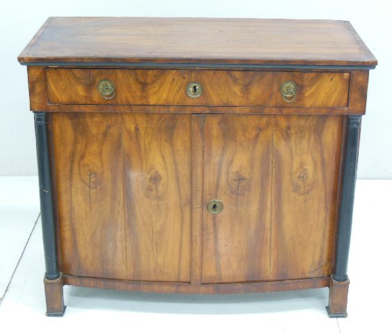 19th c. Biedermeier ebonzed fruitwood cabinet: From the Estate of Chris Peckham. Approx. 34.25" H x 38.5" x 19" D. 2 moldings missing from leg. Veneer chips. Veneer repaired.