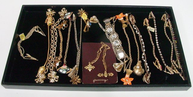 Vintage sweater clips: Including floral and faux pearl pieces. Approx. 15 pieces.From the estate of Anita Stern, owner of This-N-That antiques store, NYC.