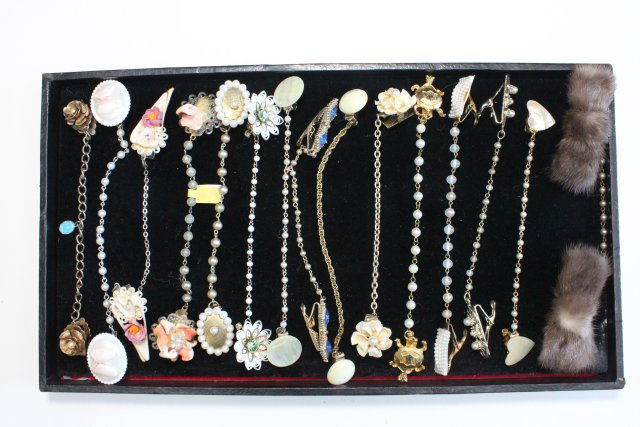 Vintage sweater clips: Including some faux pearl and faux fur pieces. Approx. 15 clips. From the estate of Anita Stern, owner of This-N-That antiques store, NYC.