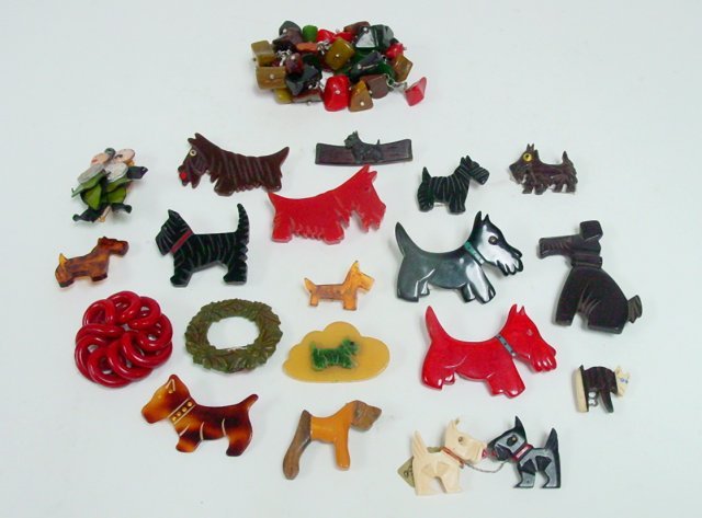 Vintage Bakelite broochers & bracelets: Including dog brooches & beaded bracelets. Approx. 20 pieces. From the estate of Anita Stern, owner of This-N-That antiques store, NYC.