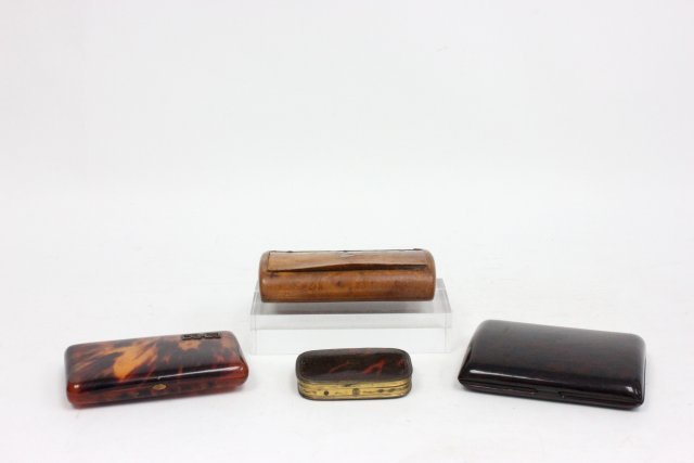 4 antique boxes: Including 19th c. amboyna wood snuff box with "mother of pearl" approx. 5.25" x 1" x 3"; faux tortoise shell cigarette case with marcasite design approx. 3" x 5" x 0.5"; Bakelite cse approx 5" x 3.75"