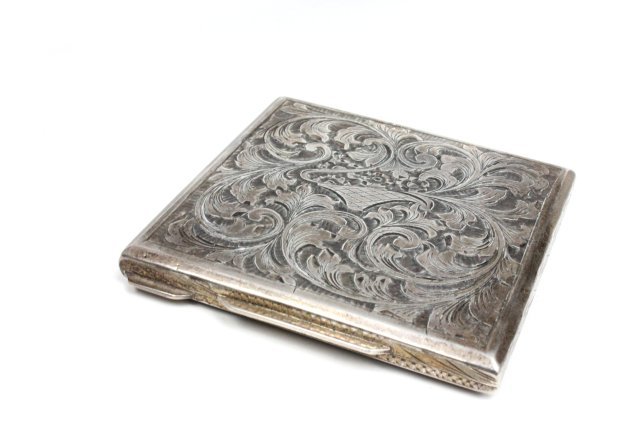 800 silver compact with floral design: Approx. 3.125" x 3.125". From the Estate of Anita Stern