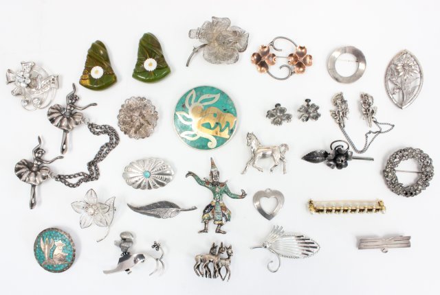 Sterling silver pins & Costume jewelry: Including ballerina & fairy sweater pins, Siam enamel figural pin, & animal, floral, mexican pins & more.