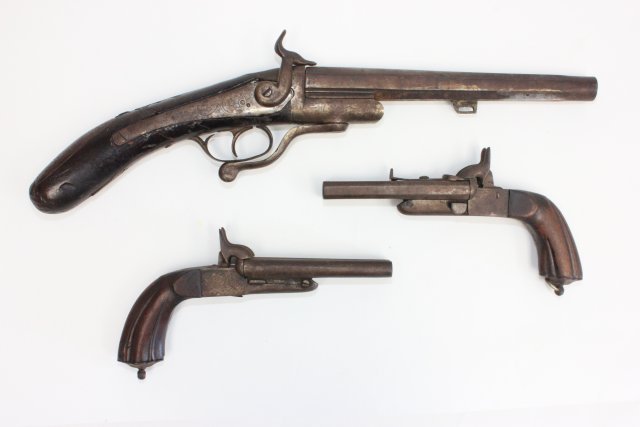3 antique dueling pistols: Including: Matched pair, double barrel, approx. 9". Single barrel, P.A. DF Fran Co Arizona EIRA, approx. 20".