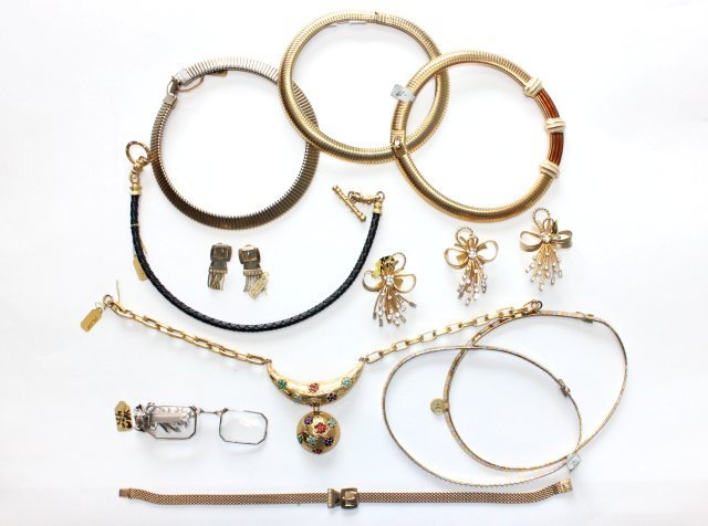 Gold colored costumer jewelry & opera glasses: Includes approx. 8 necklaces, 2 pairs of earrings, and Sterling silver & marcasite opera glasses. From the estate of Anita Stern, owner of This-N-That antiques store, NYC.